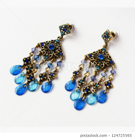 Unique earrings for women on a white background, promotional photo for an online vintage and handmade jewelry store Unique earrings for women on a white background, promotional photo for an online vintage and handmade jewelry store 124725565