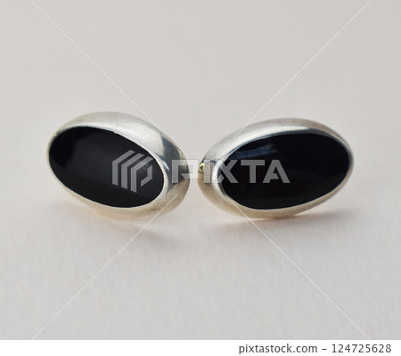 Unique earrings for women on a white background, promotional photo for an online vintage and handmade jewelry store 124725628