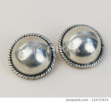Unique earrings for women on a white background, promotional photo for an online vintage and handmade jewelry store 124725674