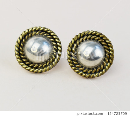Unique earrings for women on a white background, promotional photo for an online vintage and handmade jewelry store 124725709