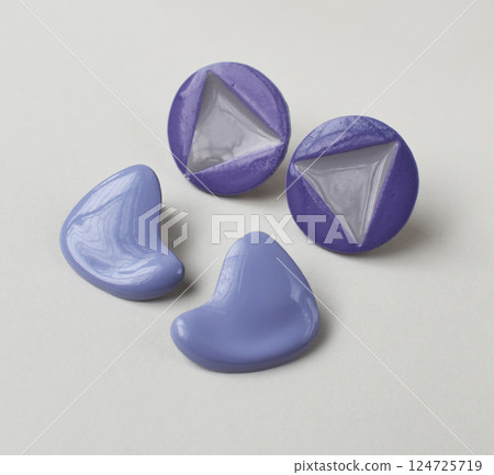 Unique earrings for women on a white background, promotional photo for an online vintage and handmade jewelry store Unique earrings for women on a white background, promotional photo for an online vintage and handmade jewelry store 124725719