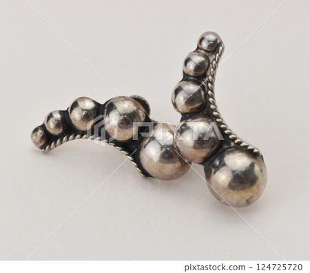 Unique earrings for women on a white background, promotional photo for an online vintage and handmade jewelry store Unique earrings for women on a white background, promotional photo for an online vintage and handmade jewelry store 124725720