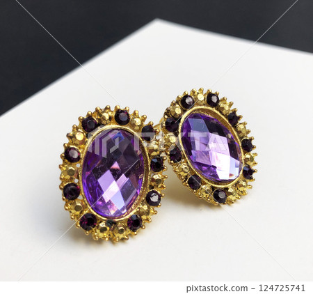 Unique earrings for women on a white background, promotional photo for an online vintage and handmade jewelry store Unique earrings for women on a white background, promotional photo for an online vintage and handmade jewelry store 124725741