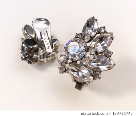 Unique earrings for women on a white background, promotional photo for an online vintage and handmade jewelry store Unique earrings for women on a white background, promotional photo for an online vintage and handmade jewelry store 124725743