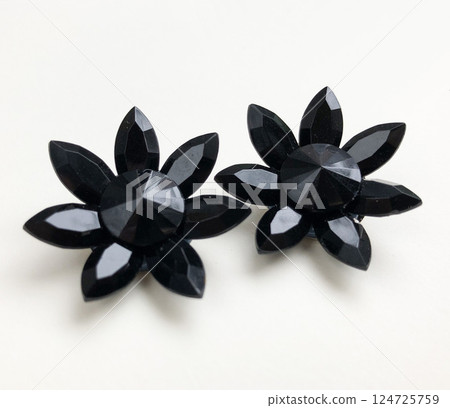 Unique earrings for women on a white background, promotional photo for an online vintage and handmade jewelry store Unique earrings for women on a white background, promotional photo for an online vintage and handmade jewelry store 124725759