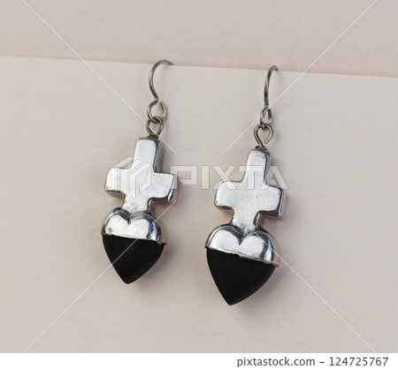 Unique earrings for women on a white background, promotional photo for an online vintage and handmade jewelry store 124725767