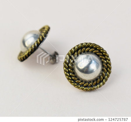 Unique earrings for women on a white background, promotional photo for an online vintage and handmade jewelry store 124725787