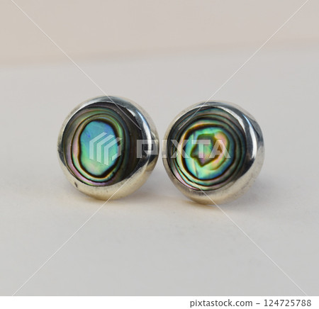Unique earrings for women on a white background, promotional photo for an online vintage and handmade jewelry store 124725788