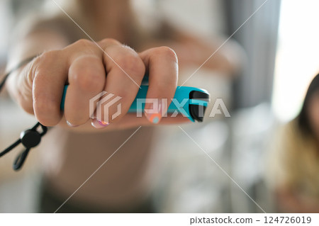 Hands using game controller. Playing video games Hands using game controller. Playing video games 124726019