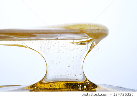 Photo of a sugar paste for depilation hair removal procedure. Texture. Photo of a sugar paste for depilation hair removal procedure. Texture. 124726325