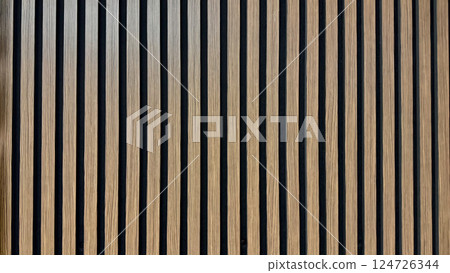 Vertical Wooden Slats Creating a Patterned Architectural Design on Indoor Walls Vertical Wooden Slats Creating a Patterned Architectural Design on Indoor Walls 124726344