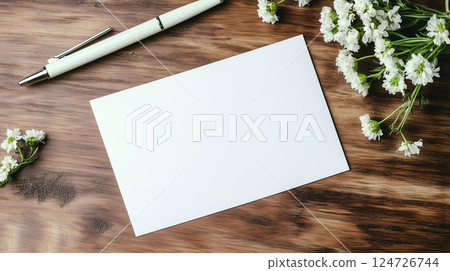 Minimalist Workspace with pen and Blank Paper 124726744