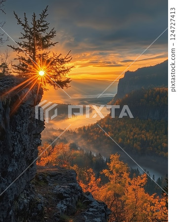 Breathtaking Sunrise Over Misty Valley 124727413