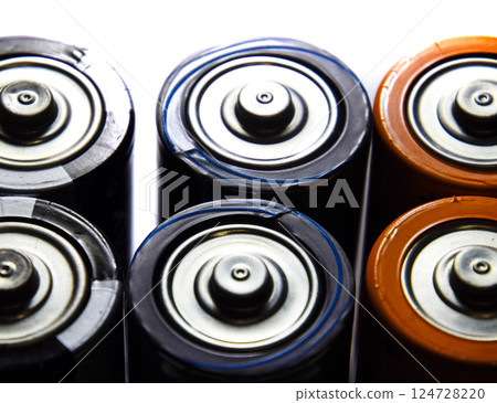 Salt and alkaline batteries, source of energy for portable technology. AAA and AA batteries Salt and alkaline batteries, source of energy for portable technology. AAA and AA batteries 124728220