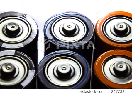 Salt and alkaline batteries, source of energy for portable technology. AAA and AA batteries 124728221