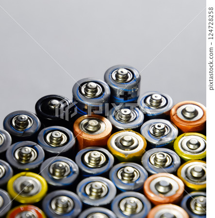 Salt and alkaline batteries, source of energy for portable technology. AAA and AA batteries Salt and alkaline batteries, source of energy for portable technology. AAA and AA batteries 124728258
