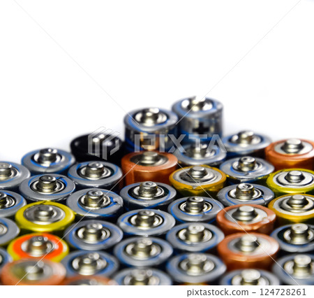 Salt and alkaline batteries, source of energy for portable technology. AAA and AA batteries 124728261