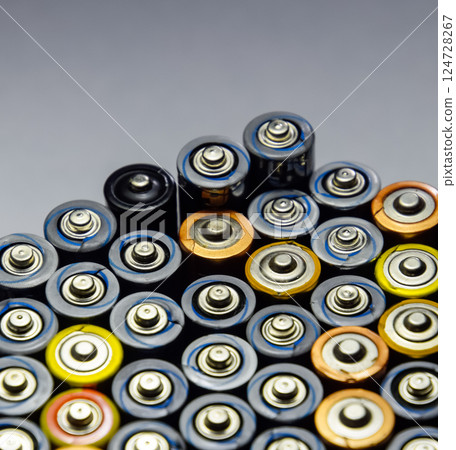 Salt and alkaline batteries, source of energy for portable technology. AAA and AA batteries Salt and alkaline batteries, source of energy for portable technology. AAA and AA batteries 124728267