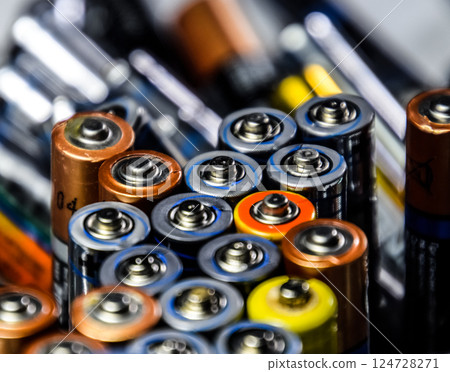 Salt and alkaline batteries, source of energy for portable technology. AAA and AA batteries Salt and alkaline batteries, source of energy for portable technology. AAA and AA batteries 124728271