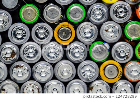 Salt and alkaline batteries, source of energy for portable technology. AAA and AA batteries 124728289