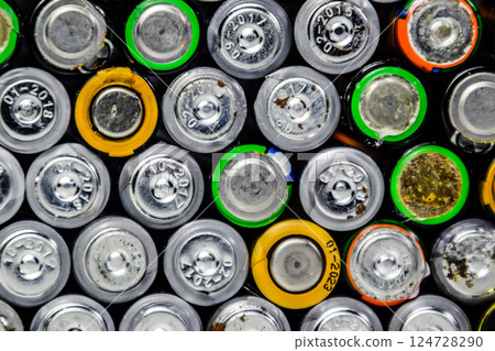 Salt and alkaline batteries, source of energy for portable technology. AAA and AA batteries 124728290