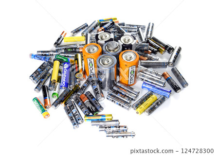 Salt and alkaline batteries, a source of energy for portable technology. AAA and AA batteries 124728300