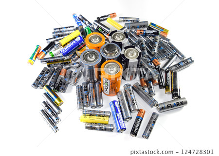 Salt and alkaline batteries, a source of energy for portable technology. AAA and AA batteries 124728301
