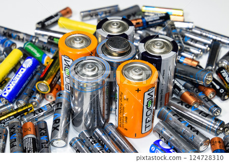 Salt and alkaline batteries, a source of energy for portable technology. AAA and AA batteries Salt and alkaline batteries, a source of energy for portable technology. AAA and AA batteries 124728310