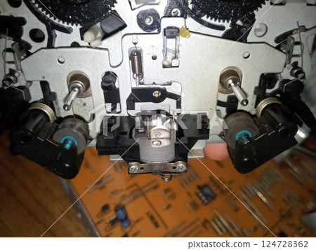 Tape pulling mechanism of the cassette deck. tape recorder 124728362