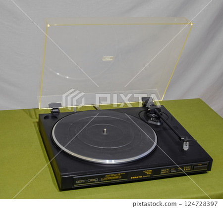 Sanyo turntable, vinyl player. Vintage analog player. Sanyo turntable, vinyl player. Vintage analog player. 124728397