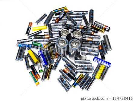 Salt and alkaline batteries, a source of energy for portable technology. AAA and AA batteries 124728416