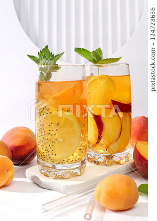 Diet vegan cocktail with chia seeds, lime, lemon, mint and apricots. Detox diet and weight loss concept, summer party and healthy lifestyle advertising. Menu for cafe and restaurant. 124728636