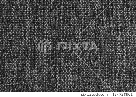 Black Jacquard fabric with large loose woven, coarse weave texture background 124728961