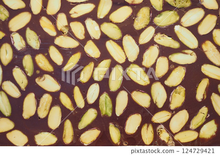 Enjoy rich Chocolate Bark with Almonds and Pistachios, ideal for any celebration 124729421