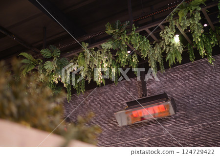 Modern electric infrared heater on celling Modern electric infrared heater on celling 124729422