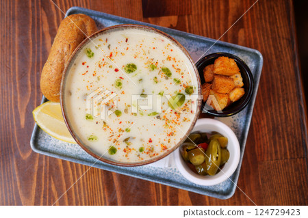 Indulge in this Delicious Creamy Soup with Savoring Sides A True Comfort Food Delight Indulge in this Delicious Creamy Soup with Savoring Sides A True Comfort Food Delight 124729423