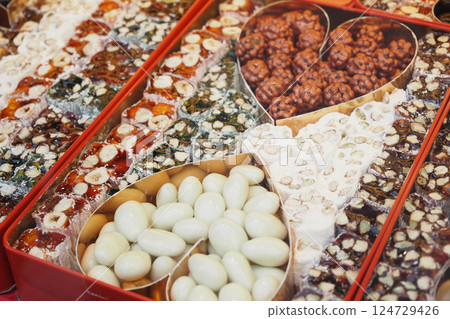 Assorted Colorful Turkish Delight Cubes on a White Plate Assorted Colorful Turkish Delight Cubes on a White Plate 124729426