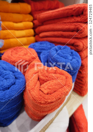 Bright Orange and Deep Blue Rolled Towels add flair and unique style to any space 124729465