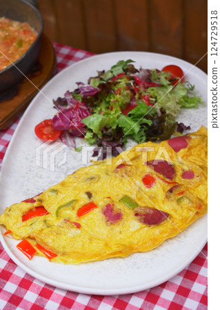 Egg Omelette with sausage on table Egg Omelette with sausage on table 124729518