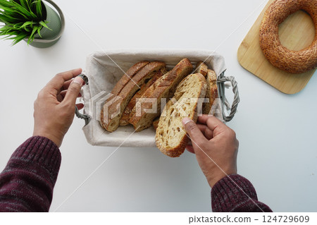 Enjoy Freshly Sliced and Made Homemade Bread, Perfectly Served in a Beautiful Serving Basket 124729609