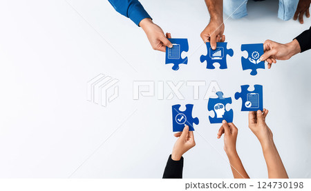 Collaborative Teamwork Symbolized by Puzzle Pieces with Icons Representing Growth, Strategy, Analysis, and Success in Business Settings. Amity 124730198