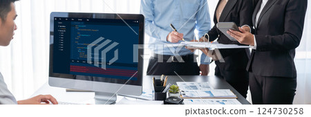 Analyst team working on data analysis dashboard on laptop screen. Insight Analyst team working on data analysis dashboard on laptop screen. Insight 124730258