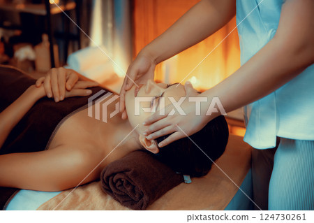 Caucasian woman enjoying relaxing anti-stress head massage. Quiescent 124730261