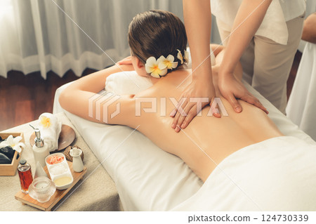 Caucasian woman customer enjoying relaxing anti-stress massage. Quiescent 124730339