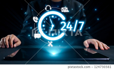 Digital Clock Icon Demonstrating 24 hour Availability with Communication Symbols and Hands on Tablet in Modern Business Concept. Qubit Digital Clock Icon Demonstrating 24 hour Availability with Communication Symbols and Hands on Tablet in Modern Business Concept. Qubit 124730381