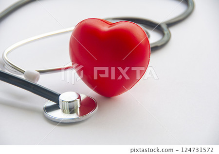 A view of stethoscope and a red heart shape with customizable space for text. Medical and health concept A view of stethoscope and a red heart shape with customizable space for text. Medical and health concept 124731572