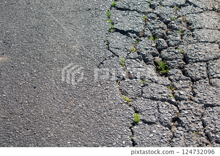 Cracked asphalt 124732096