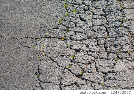 Cracked asphalt 124732097