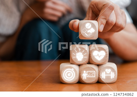 Wooden blocks with fitness icons representing personal training, health, and wellness concepts for motivation and lifestyle. Wooden blocks with fitness icons representing personal training, health, and wellness concepts for motivation and lifestyle. 124734862