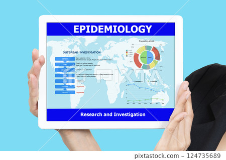 Hand holding digital tablet showing epidemiology research analysis result on screen. 124735689